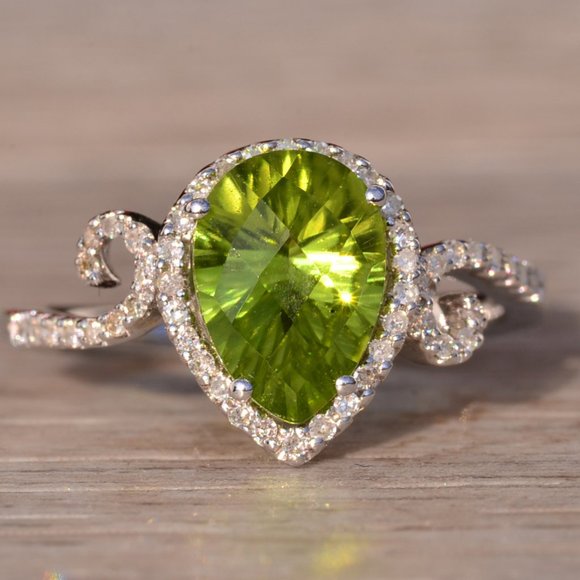 Peridot and Natural Diamond Ring in White Gold